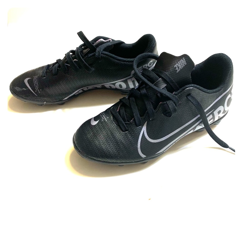 Boys Nike black cleats